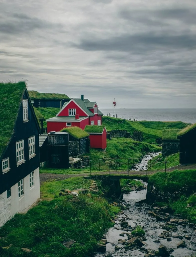 Colourful houses on lush Mykines in the Faroe Islands